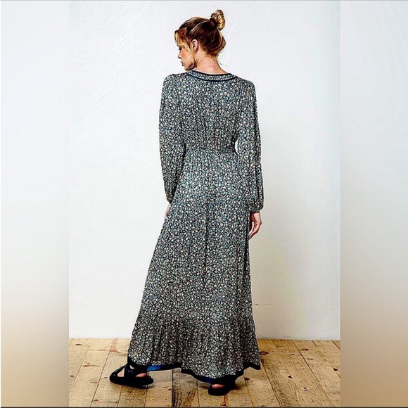 Boho Floral Maxi Dress | Navy Blue Long Sleeve Ruffle Hem Dress with Tassels - Picture 3 of 5